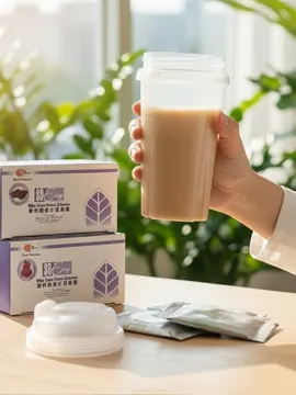 A hand holding the So Easy nutritional cleanse drink in a shaker, representing an easy, guided meal replacement program